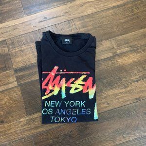 Black Stussy Rainbow shirt.